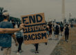 End systemic racism